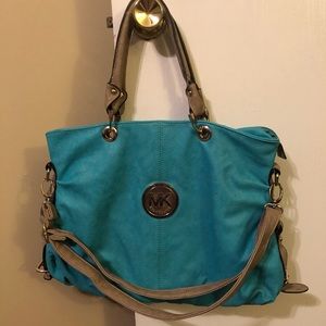 MK teal handbag